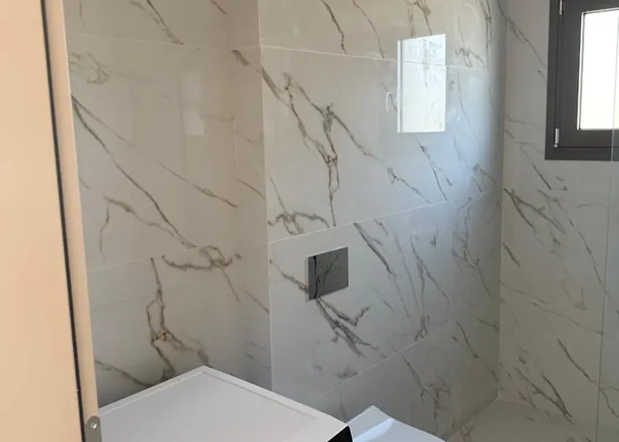 Poseidon 77b Luxury Residences Apartamento *